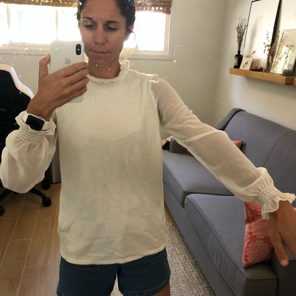 Sweater blouse. Torso is sweater, arms are sheer